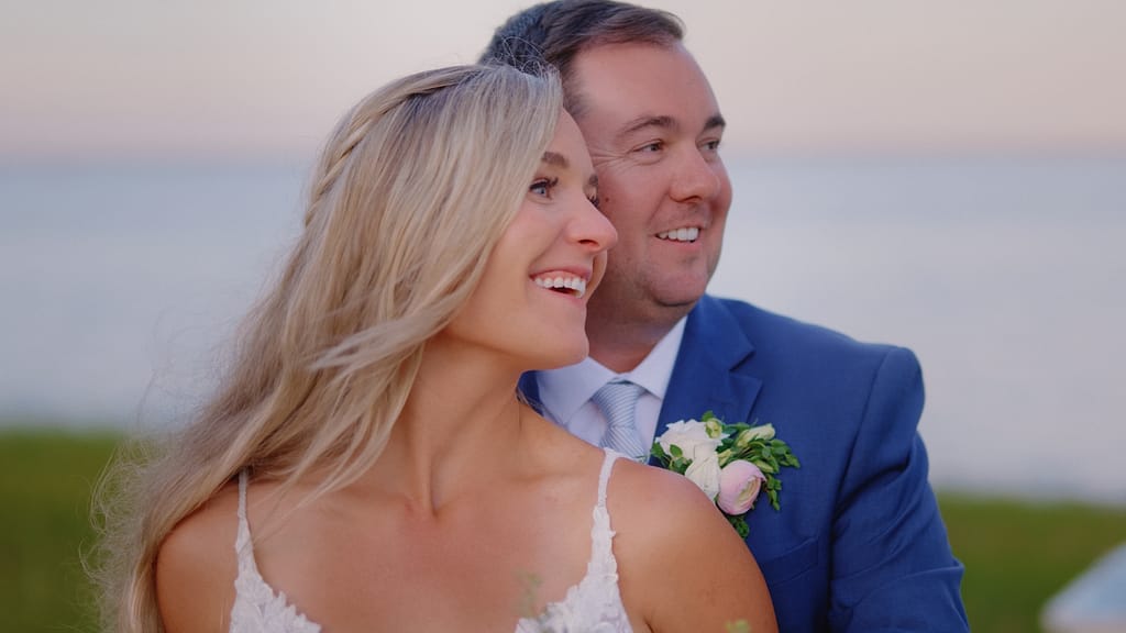 beautiful sunset on the south shore of Boston in Duxbury. couple is smiling and having fun, Boston Cape Cod wedding Videographers